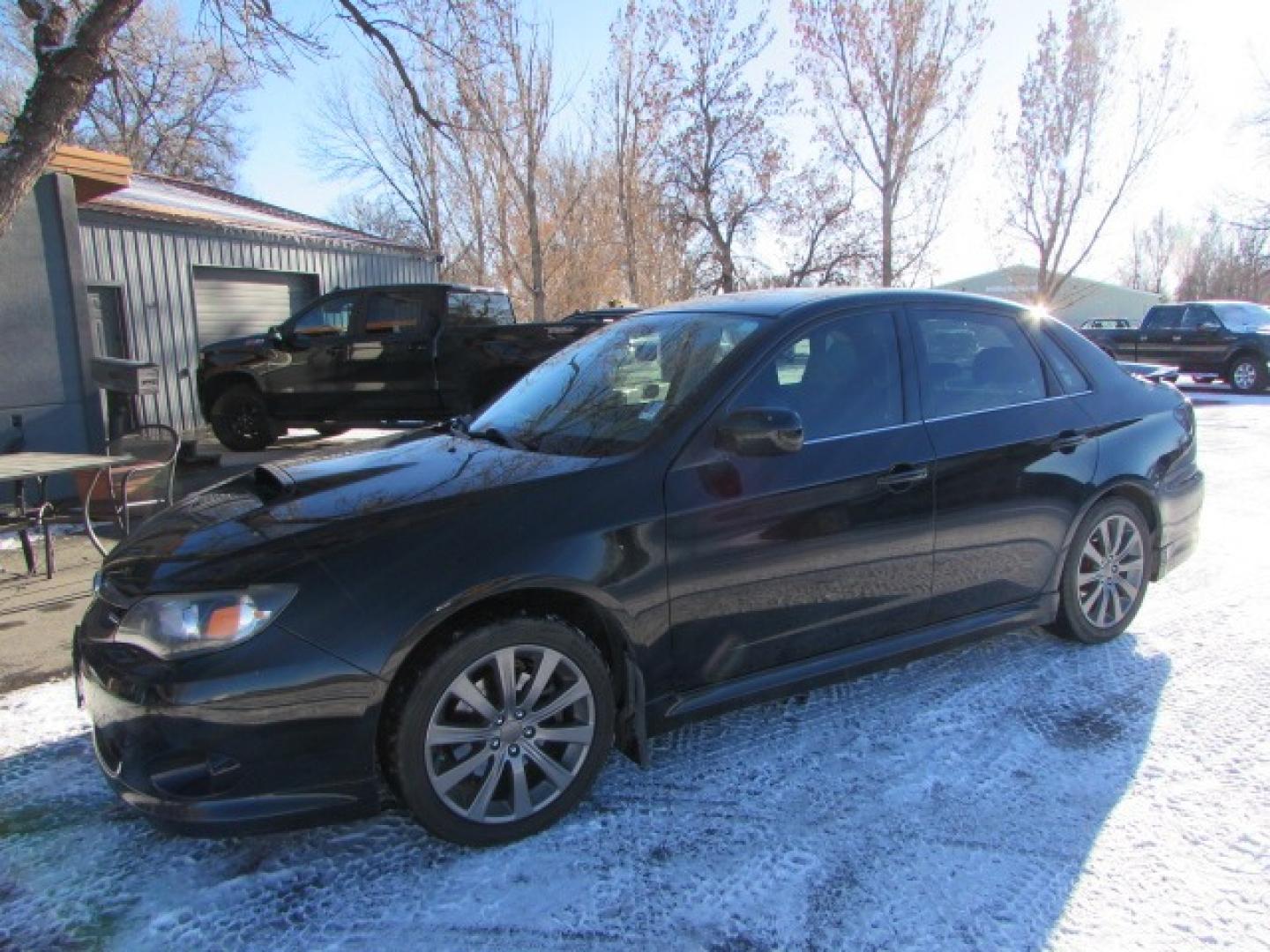 2009 Black /Black Subaru Impreza WRX Premium 4-Door (JF1GE76669G) with an 2.5L H4 DOHC 16V TURBO engine, 5-Speed Manual transmission, located at 4562 State Avenue, Billings, MT, 59101, (406) 896-9833, 45.769516, -108.526772 - 2009 Subaru Impreza WRX Sedan - 5 speed manual - 88,000 miles! 2.5L H4 DOHC 16V intercooled turbo boxer engine - 5 speed manual transmission - All wheel drive - 88,192 miles - Inspected and serviced - copy of inspection and work performed as well as full history report provided Climate contro - Photo#0